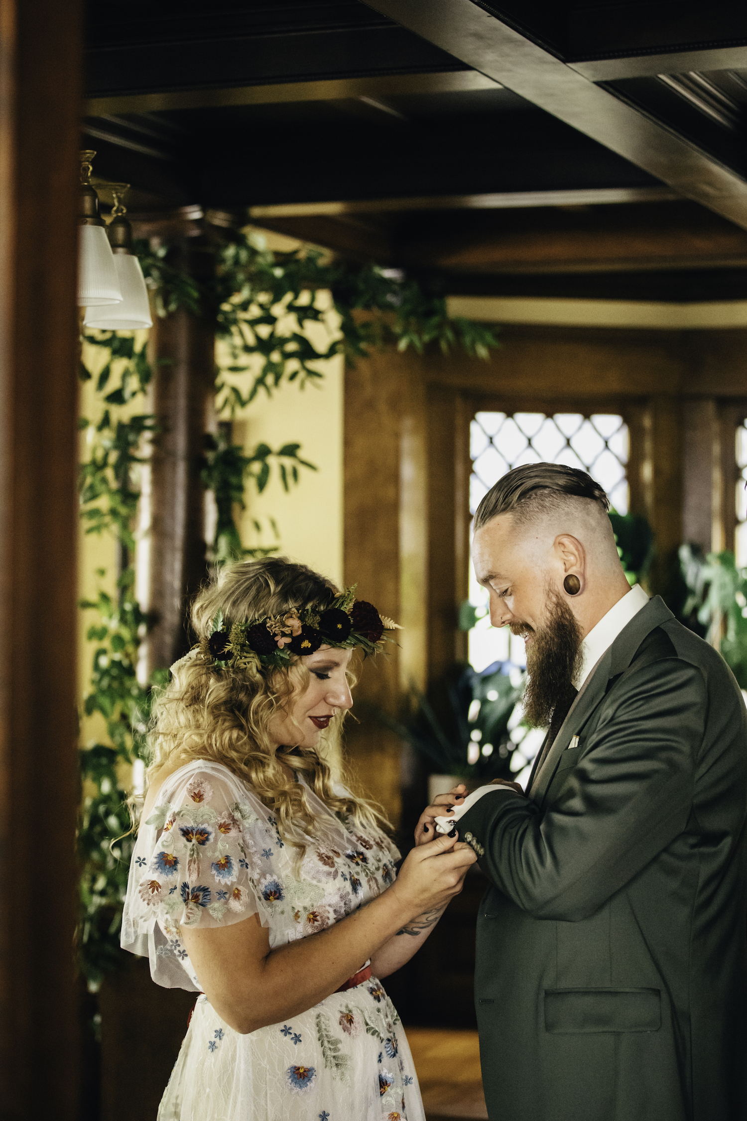 Bride looking at her grooms attire for their Grand Rapids Backyard wedding