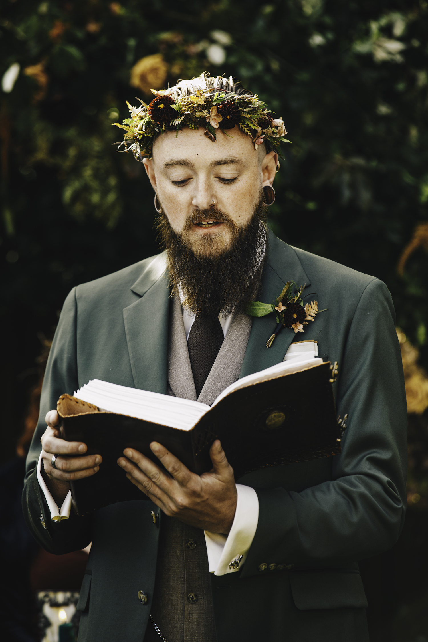Groom reading from book