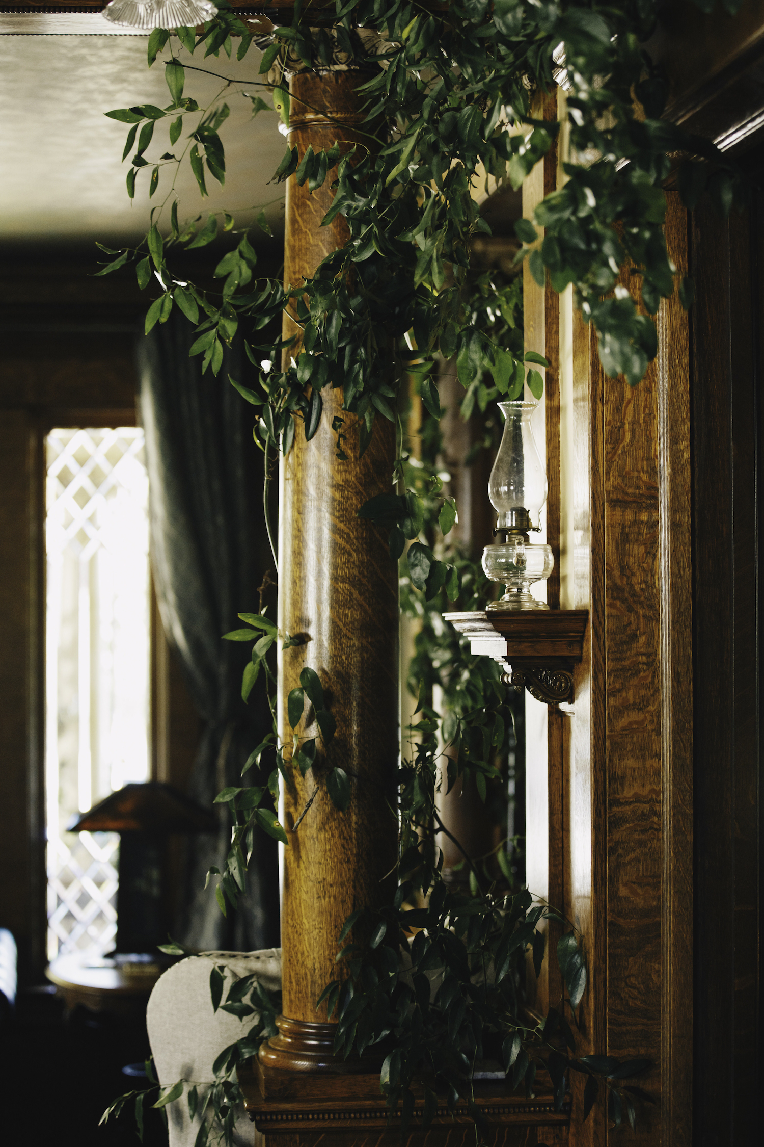 Greenery on pillar of Grand Rapids Backyard wedding