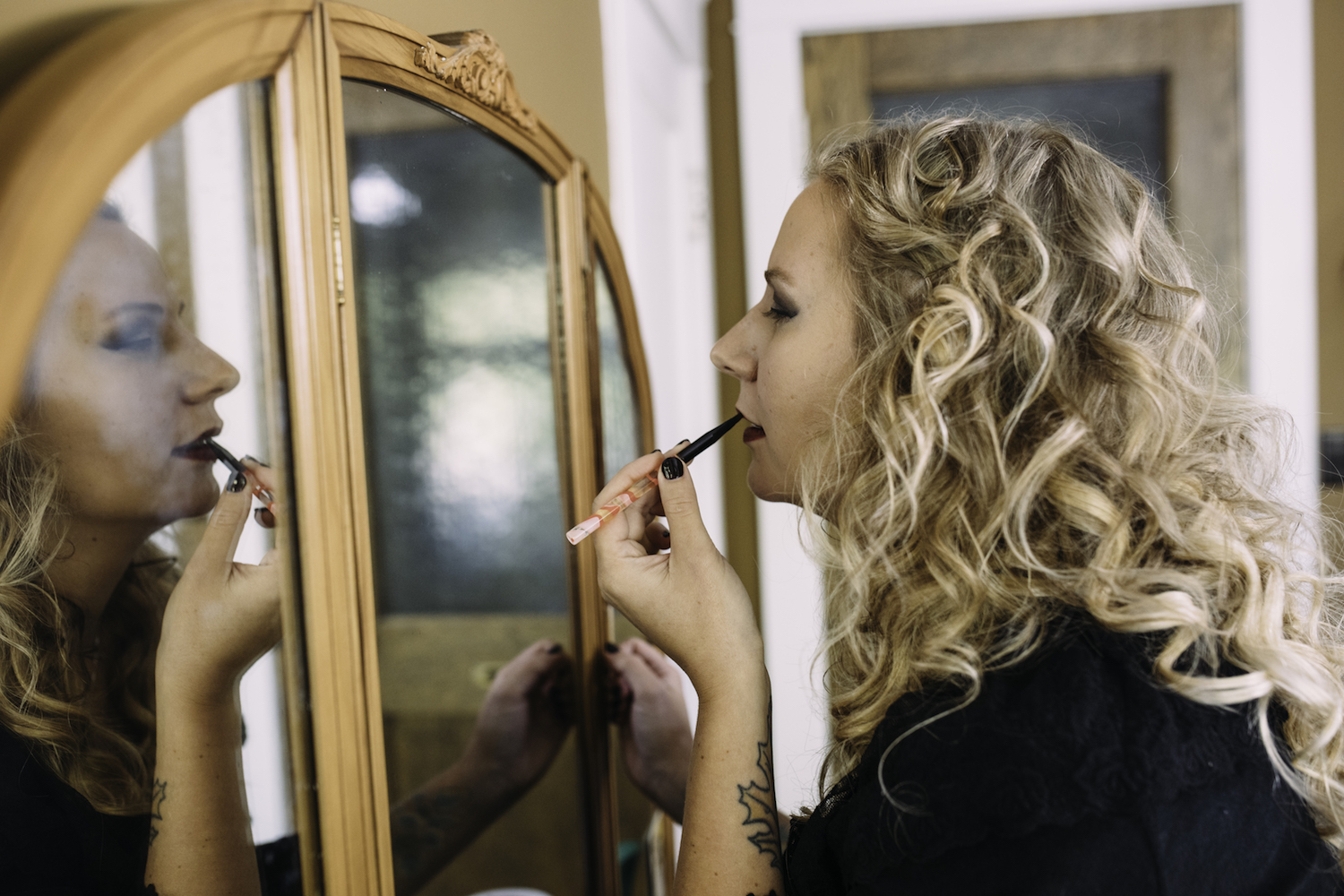 Bride getting ready for her Grand Rapids Backyard wedding