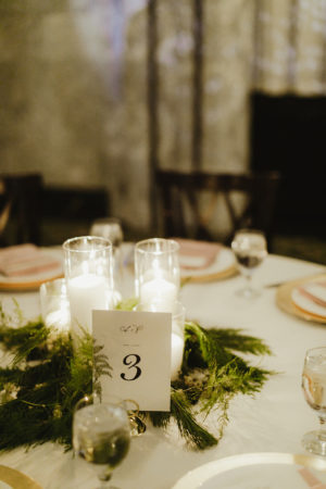 Tables set with winter wedding decor