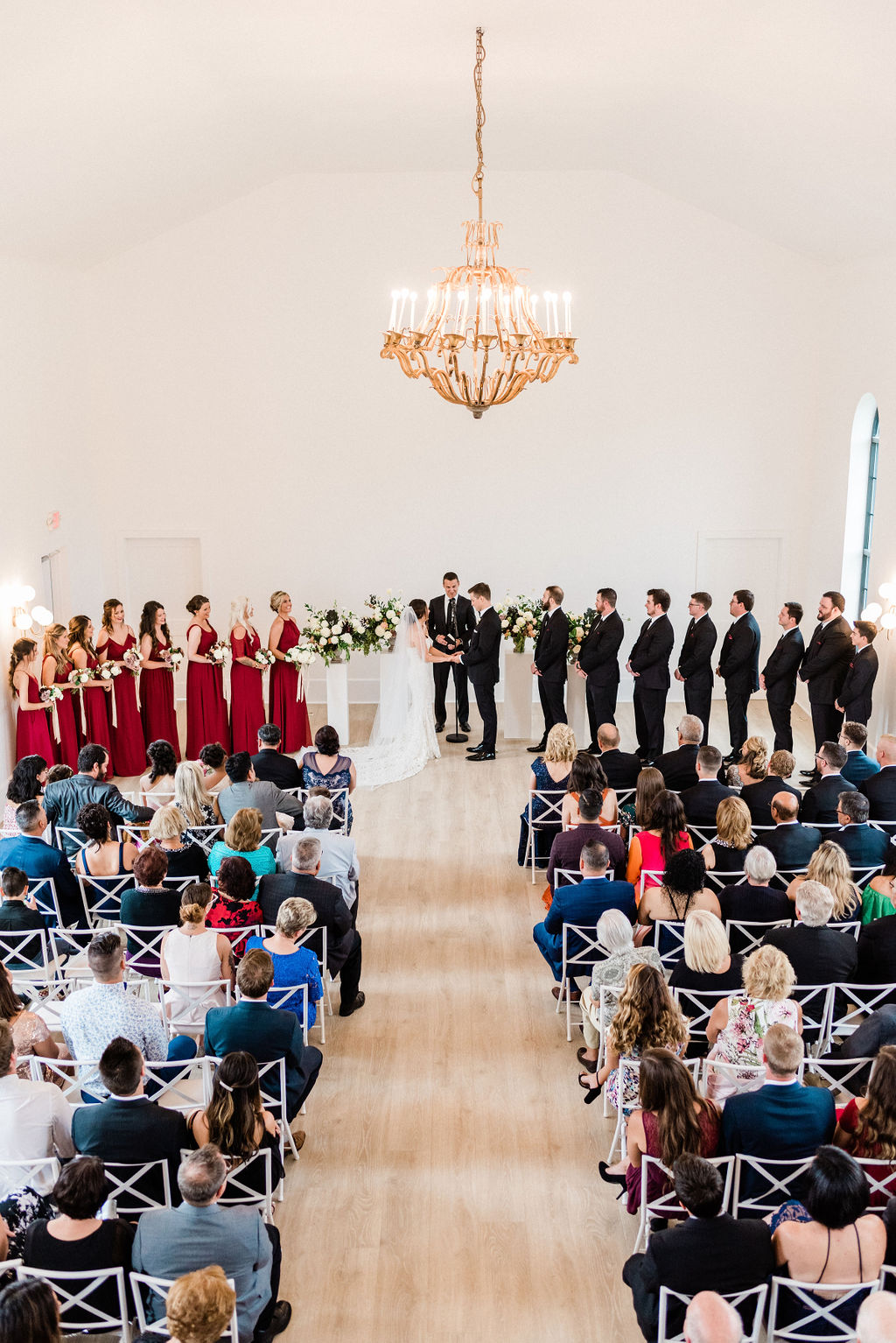 A wedding ceremony taking place at the Loft 310 Chapel in Kalamazoo, Michigan
