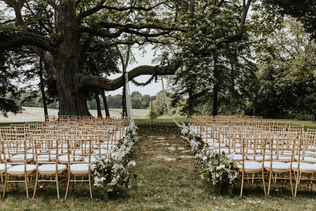 Ceremony set-up for a Hidden vineyard wedding barn wedding