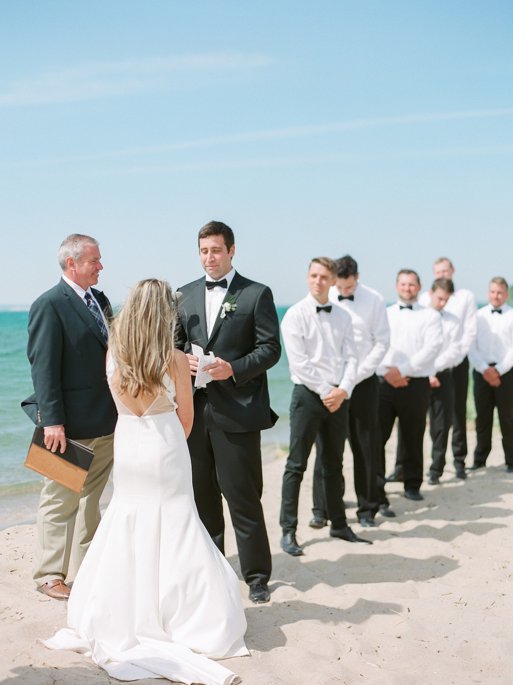 A couple getting married on the beach 