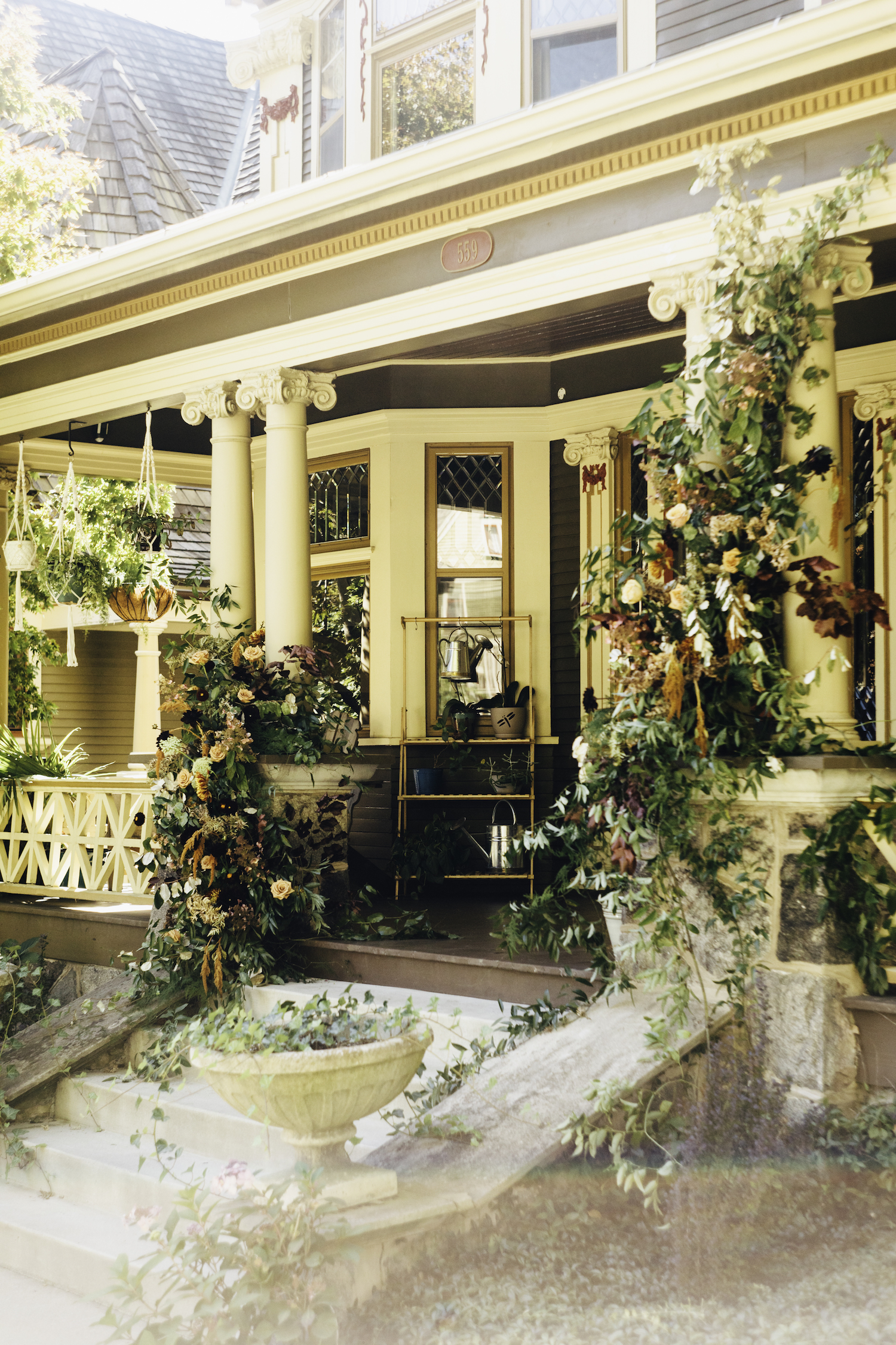 Florals on front porch of Grand Rapids Backyard wedding